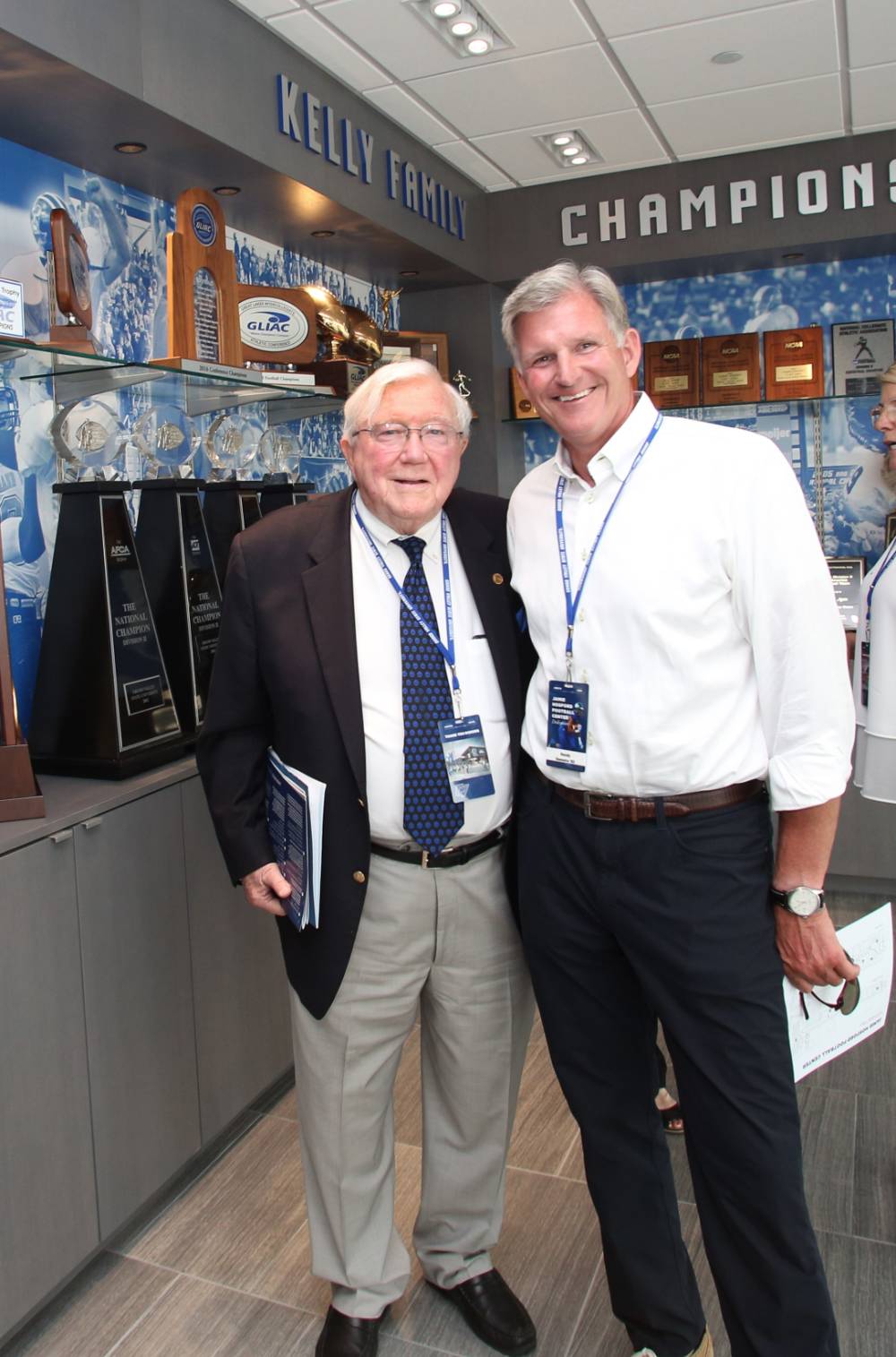 President Emeritus Don Lubbers posing with Randy Damstra at the Jamie Hosford Football Center dedication.